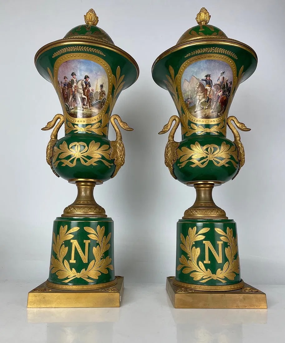 A LARGE PAIR EMPIRE ORMOLU MOUNTED SEVRES VASES: Circa 1810. Signed Tusard. Measures 23 inches high. Estimate $6000-8000