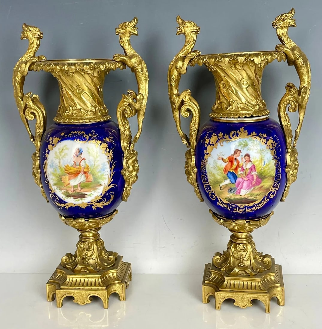 FINE PAIR OF ORMOLU MOUNTED SEVRES PORCELAIN VASES: Circa 1880. Measure 11 inches high. Good condition. Estimate $1.500-2.000