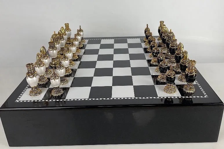 IMPERIAL FABERGE CHESS SET: Enamelled , complete set with chess board/ box. In excellent condition. Estimate $2500-3000