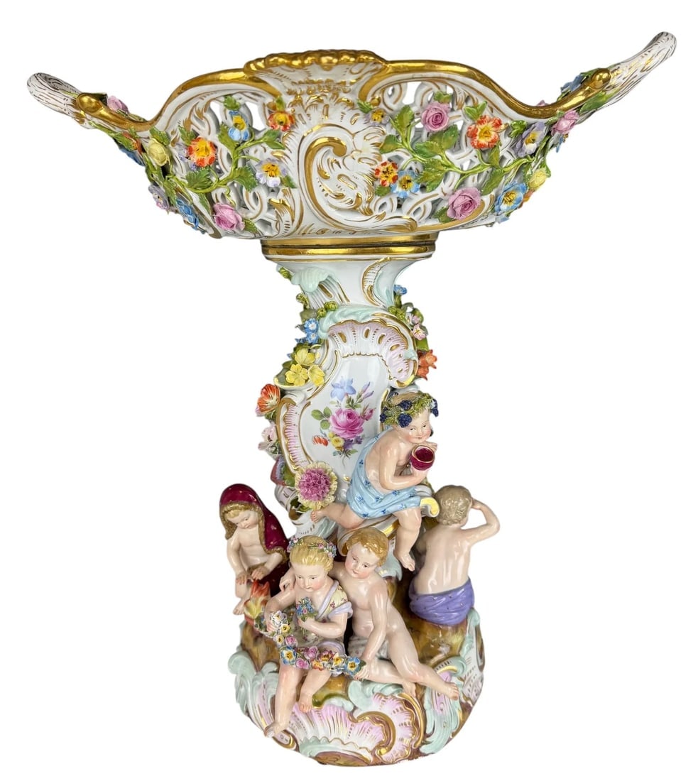 19TH C. LARGE MEISSEN CENTERPIECE: Depicting the 4 seasons. 18 inches tall. No major defect detected , in overall good condition, minor losses to leaves and petals only. Estimate $4000-5000