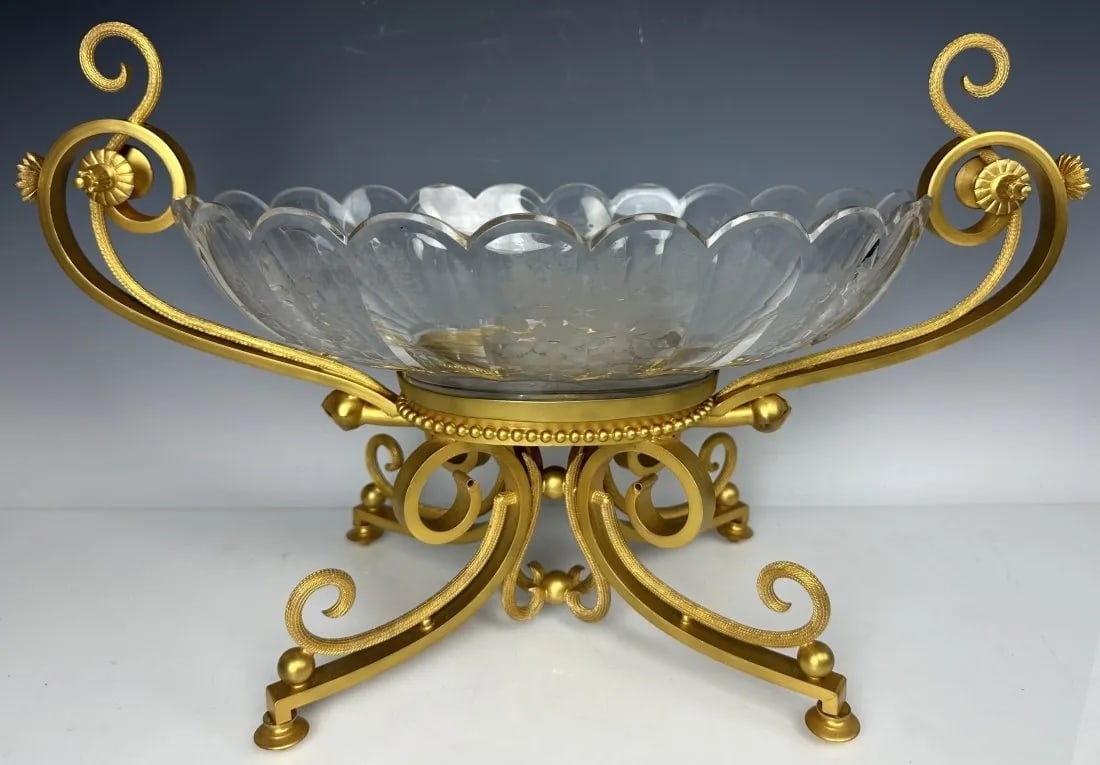 A LARGE ORMOLU AND ETCHED BACCARAT CENTREPIECE: Circa 1900. Measures 19 inches; from one handle to other. In good antique condition.Estimate $2.000-3.000