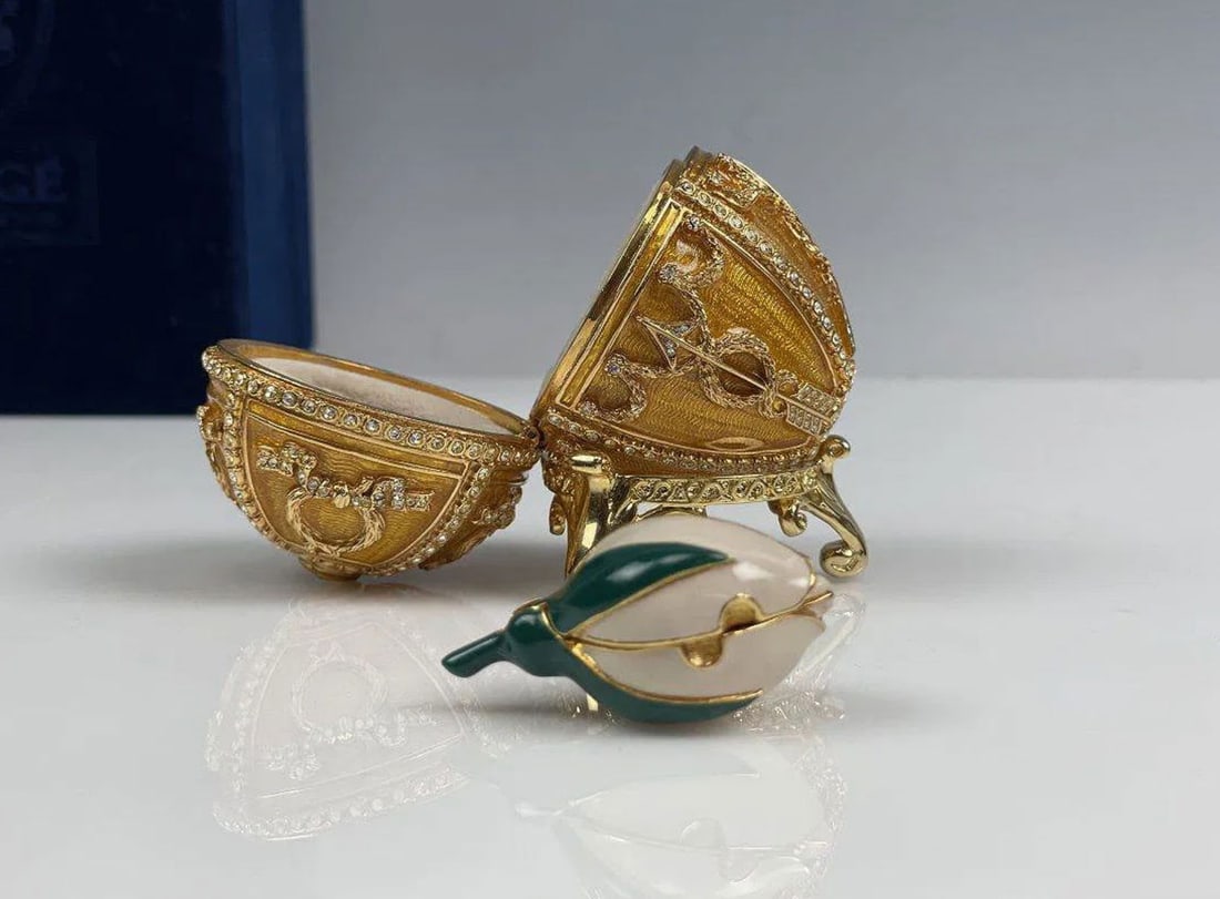 IMPERIAL FABERGE ENAMEL ROSE BUD EGG: In original presentation box. Excellent condition. Estimate $1200-1500