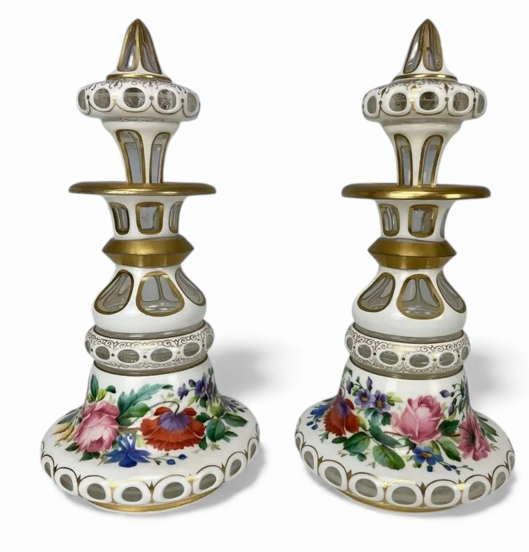 A PAIR OF GILT AND ENAMELED MOSER PERFUME BOTTLE: Circa 1900. Measure 8 inches tall. In good condition. Estimate $1500-2000