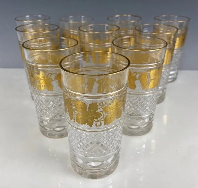 SET OF 10 GILT VAL ST LAMBERT GLASSES: Measure 5.25 inches high. All in good used condition. Estimate $1.500-2.000
