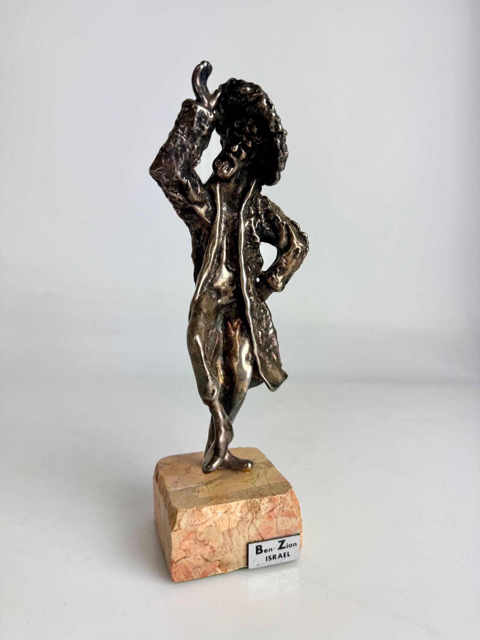 VINTAGE STERLING SILVER FIGURE OF A HASSIDIC MAN DANCING: Measures 7” h. BY BEN ZION. ESTIMATE $200-300