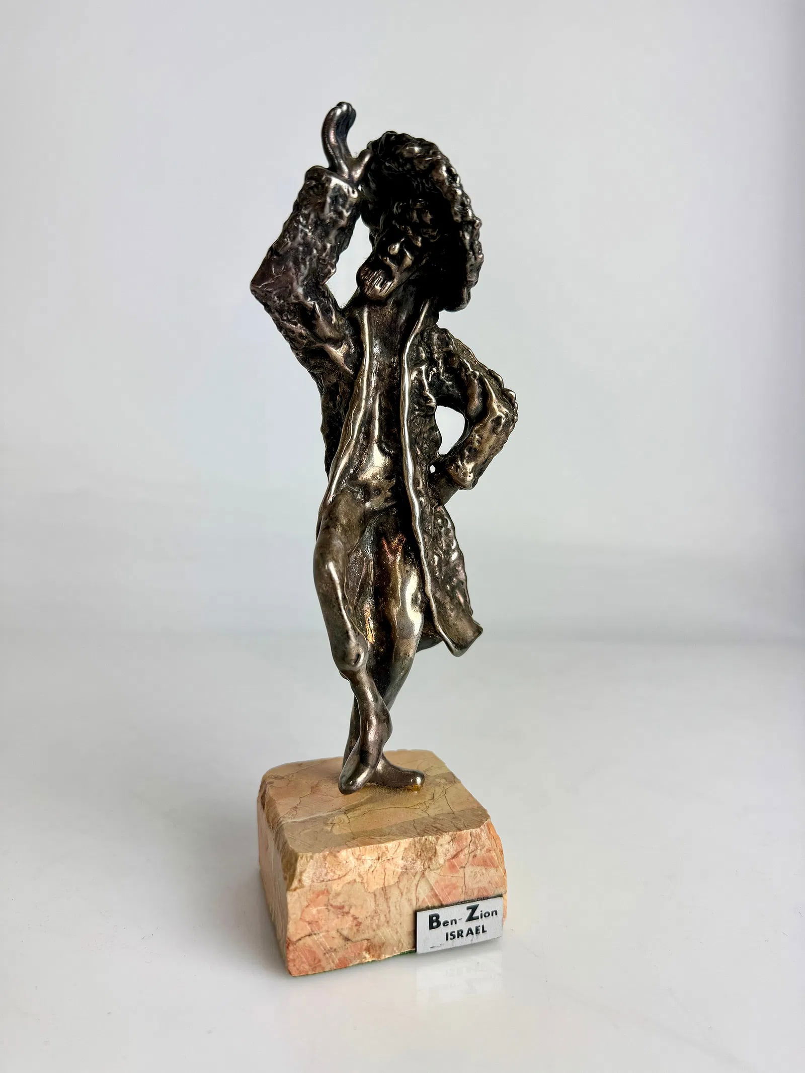 VINTAGE STERLING SILVER FIGURE OF A HASSIDIC MAN DANCING: Measures 7 inches h. BY BEN ZION. ESTIMATE $200-300