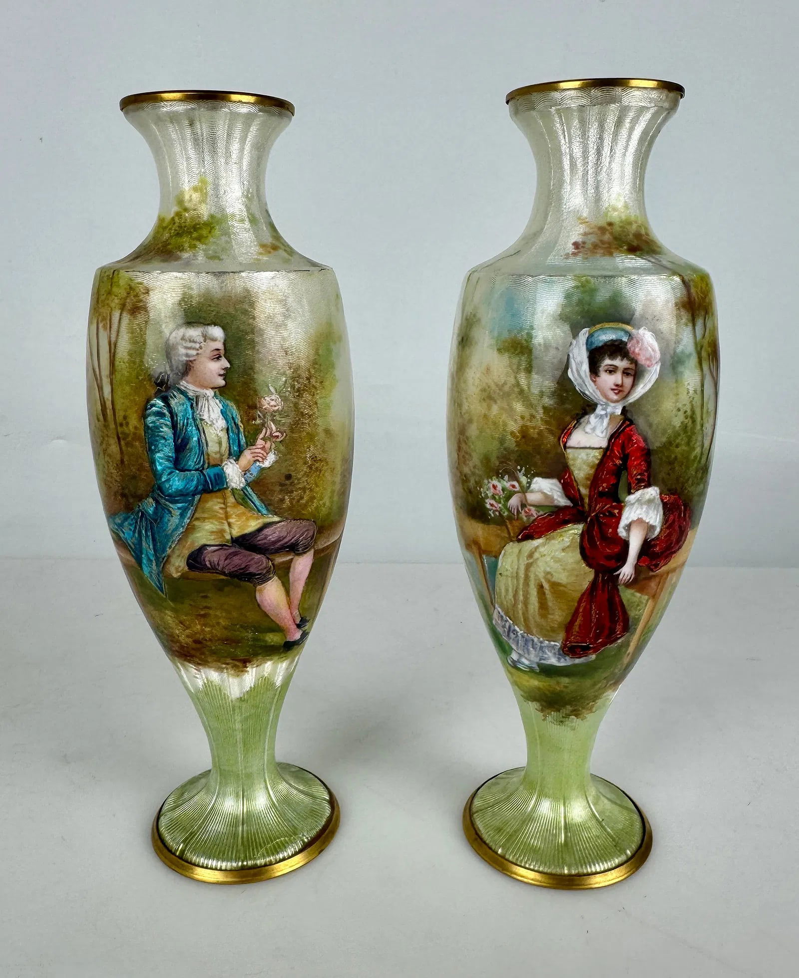 A PAIR OF FRENCH ENAMEL VASES: Circa 1900. Measures 8.5 inches h. In good condition, no breaks, no damage. Estimate $1000-1500