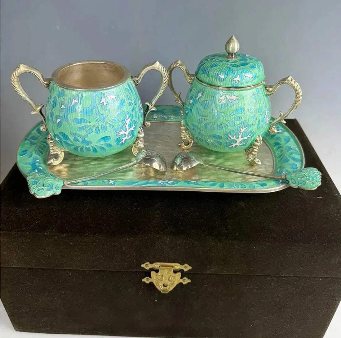 KOREAN 99% SILVER AND ENAMEL TEA SET: In Original presentation box. All pieces marked 99% Silver. In good condition, Estimate $2500-3000