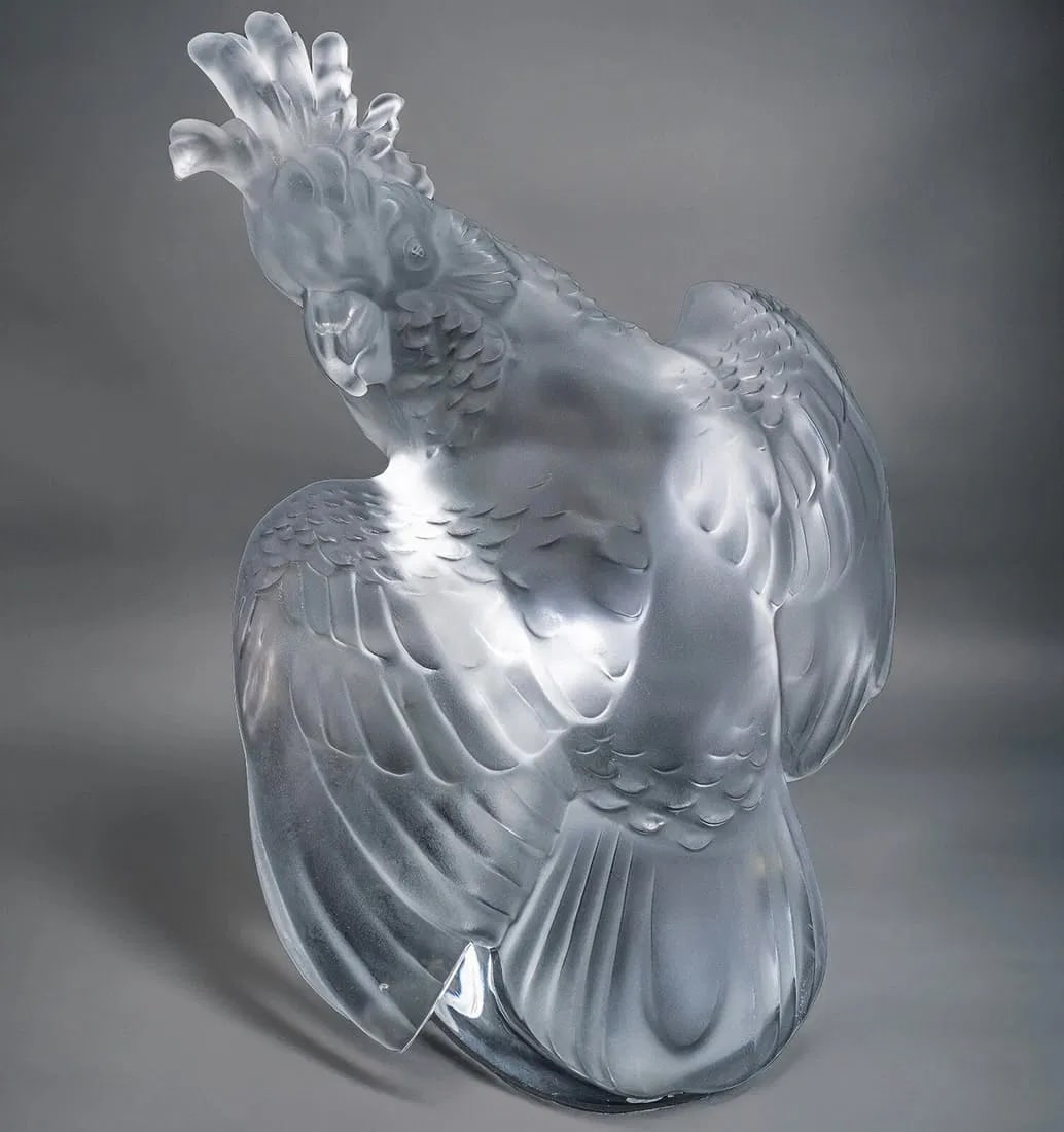 LALIQUE COCKATOO: Signed Lalique France. Measures 11.25 inches tall. In excellent condition. Estimate $2000-2500