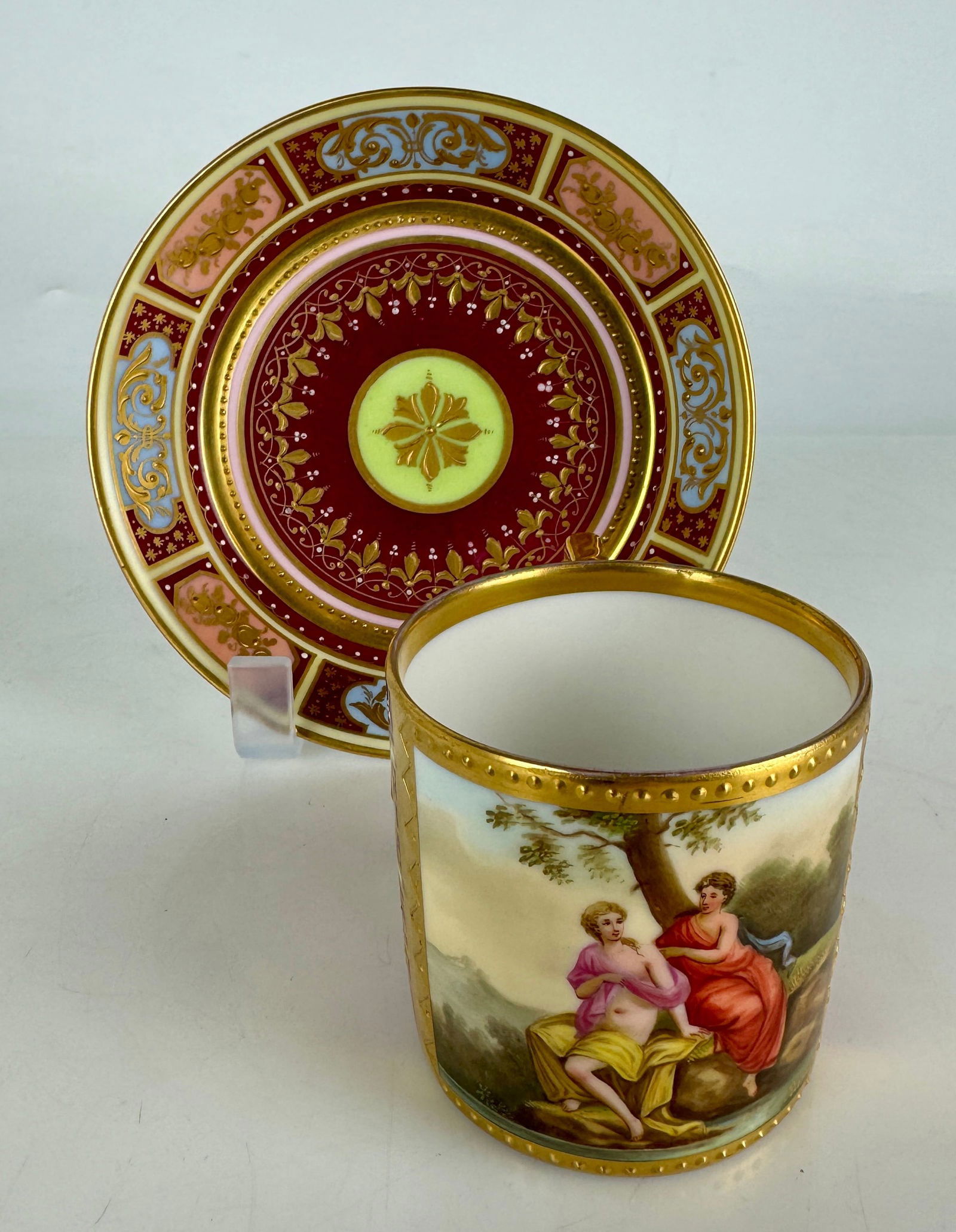 ANTIQUE ROYAL VIENNA CUP AND SAUCER: Circa 1900. In excellent condition. Estimate $400-500