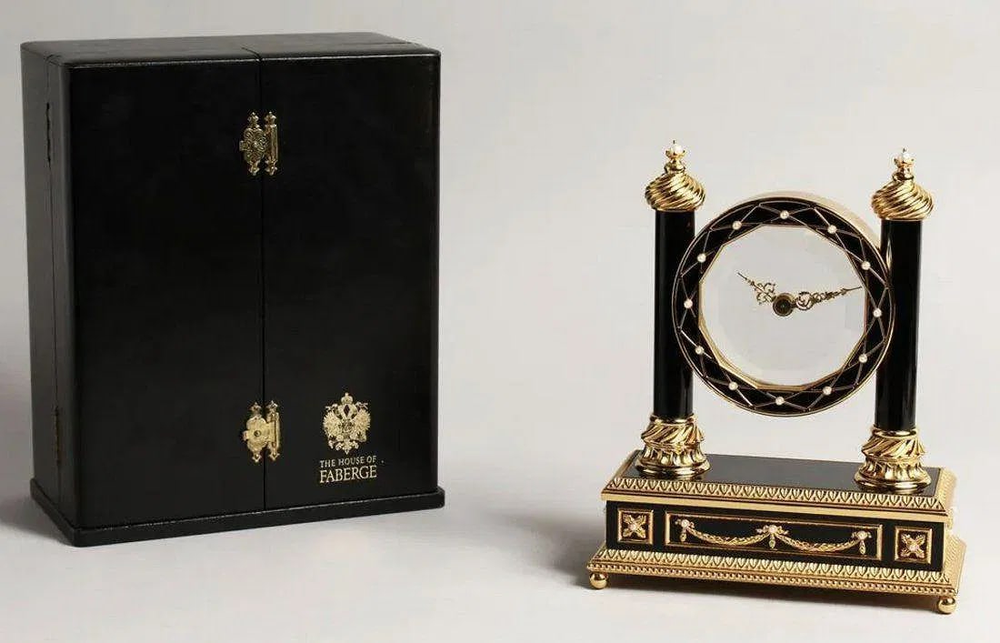 A FABERGE MYSTERY CLOCK BY THE FRANKLIN MINT, 1988.: Title: Imperial Faberge Mystery Clock - 24k Gold Plated, Crystal, PearlsSize: 7 inches wide and 9 inches tall Description: The Mystery Clock by the House of Faberge was distributed through the