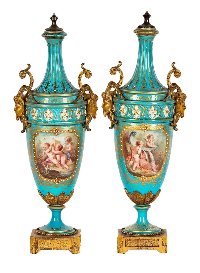 A PAIR OF JEWELLED SEVRES PORCELAIN VASES: Circa 1880. Measure 16 inches tall. In good condition, no breaks, no restoration. Estimate $1500-2000