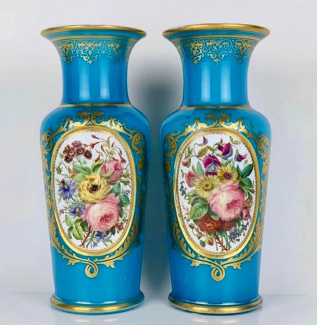 A MAGNIFICENT PAIR OF OPALINE BACCARAT VASES: Circa 1900. Measure 12 inches high. In excellent condition. Estimate $4000-5000
