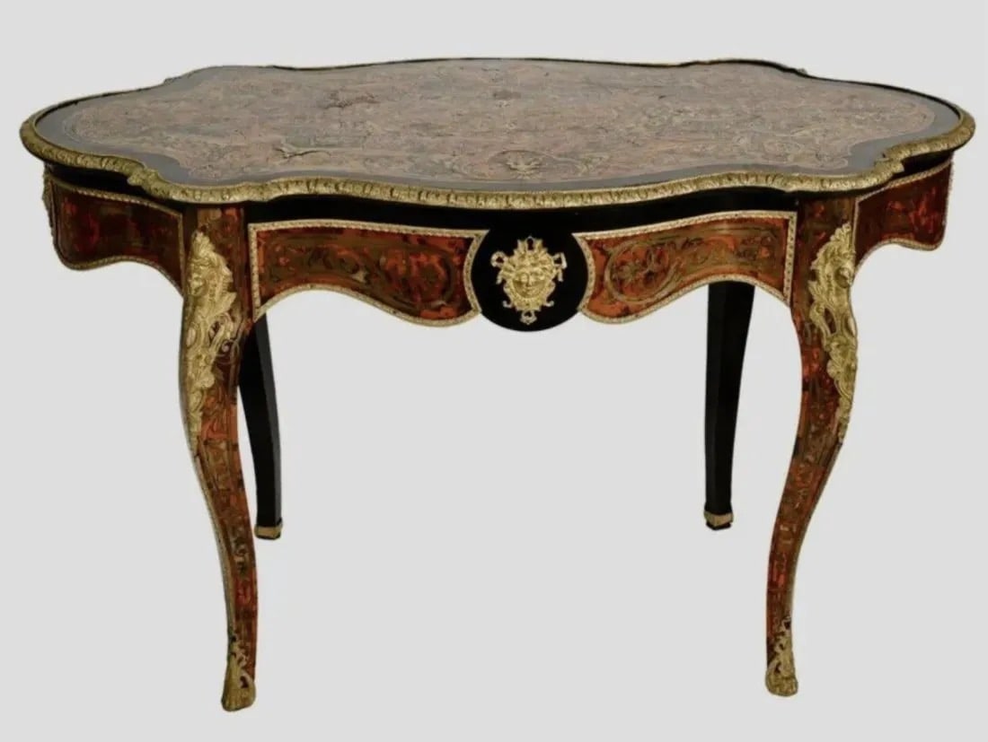 ANTIQUE ORMOLU MOUNTED BOULE TABLE: Circa 1900. Dimension 30" x 52".x 31 inches high. Estimate $3,000-4,000