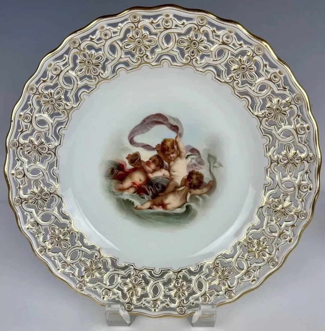 19TH C. MEISSEN RETICULATED PLATE: First quality cross swords mark. Measures 9.5 inches d. Estimate $2.000-2.500