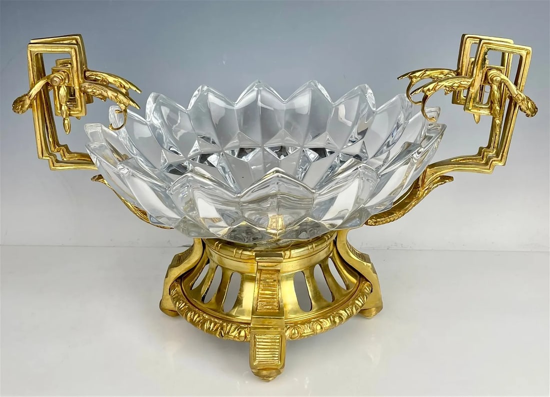 A LARGE ORMOLU AND CUT CRYSTAL CENTERPIECE: Measures 19 inches l., 11 inches high. In good used condition. Estimate $800-1.000