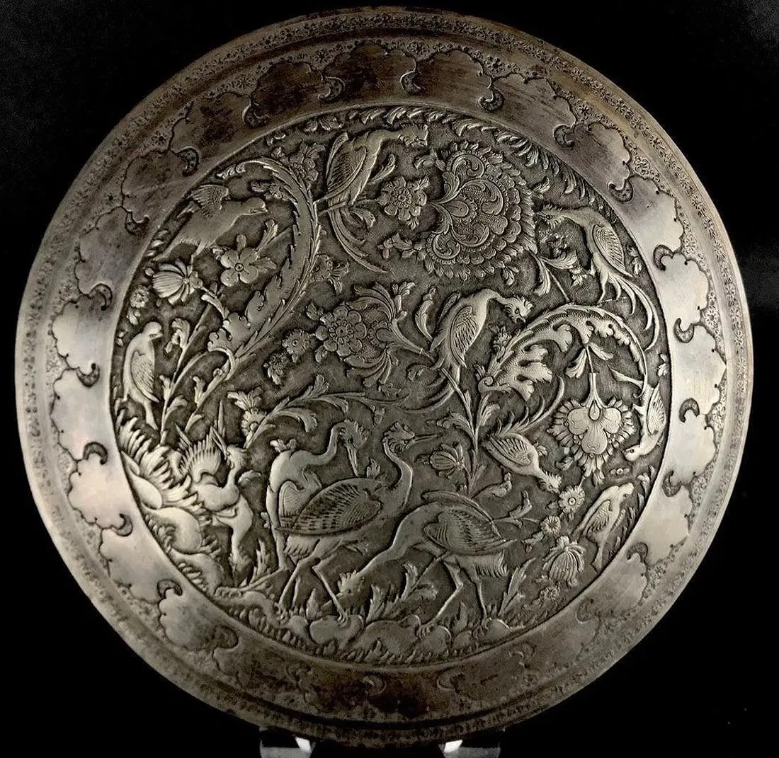 A VERY FINE MID CENTURY PERSIAN SILVER BOX: Marked 84 , and makers name. Measures 10 inches diameter , and weighs 999 grams. Good condition.Estimate $3000-3500