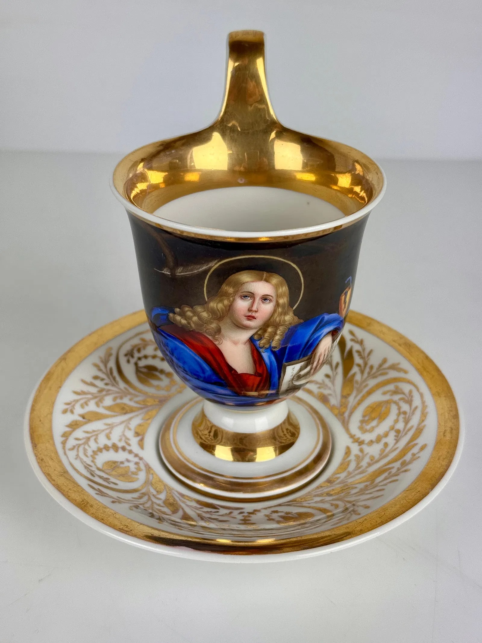 19TH C. BERLIN KPM CUP AND SAUCER: In excellent condition. Estimate $800-1000