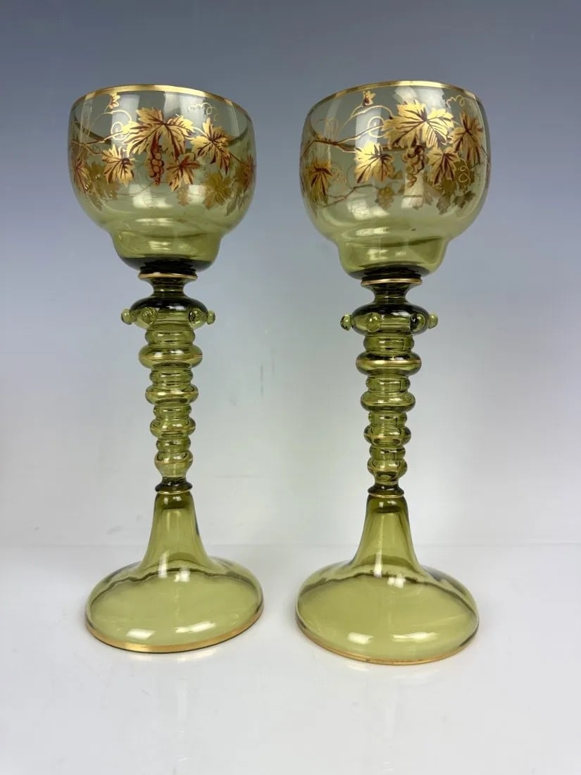 A PAIR OF GILT MOSER WINE GLASSES: Circa 1900. Measure 8 inches high. In good antique condition. Estimate $300-400