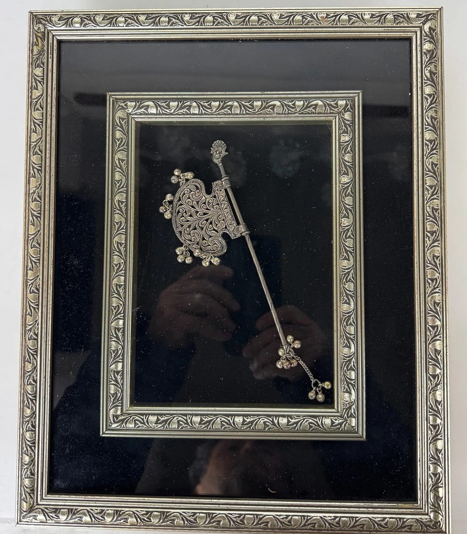 INDIAN SILVER TEMPLE FAN RATTLE FRAMED: Antique Pankhi temple fan rattle in high quality silver framed. Estimate $600-800