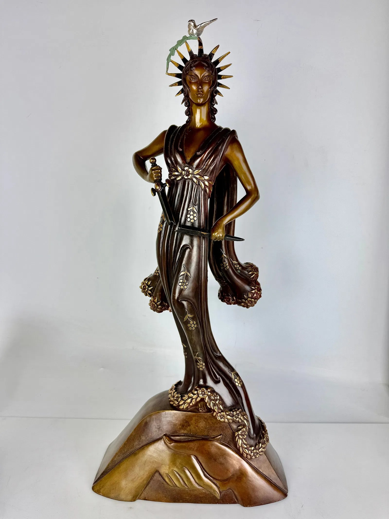 A LARGE ERTE BRONZE SCULPTURE DEPICTING PEACE: Signed ERTE, with foundry stamps. Measures 25.5 inches tall. In good condition. Estimate $3000-4000
