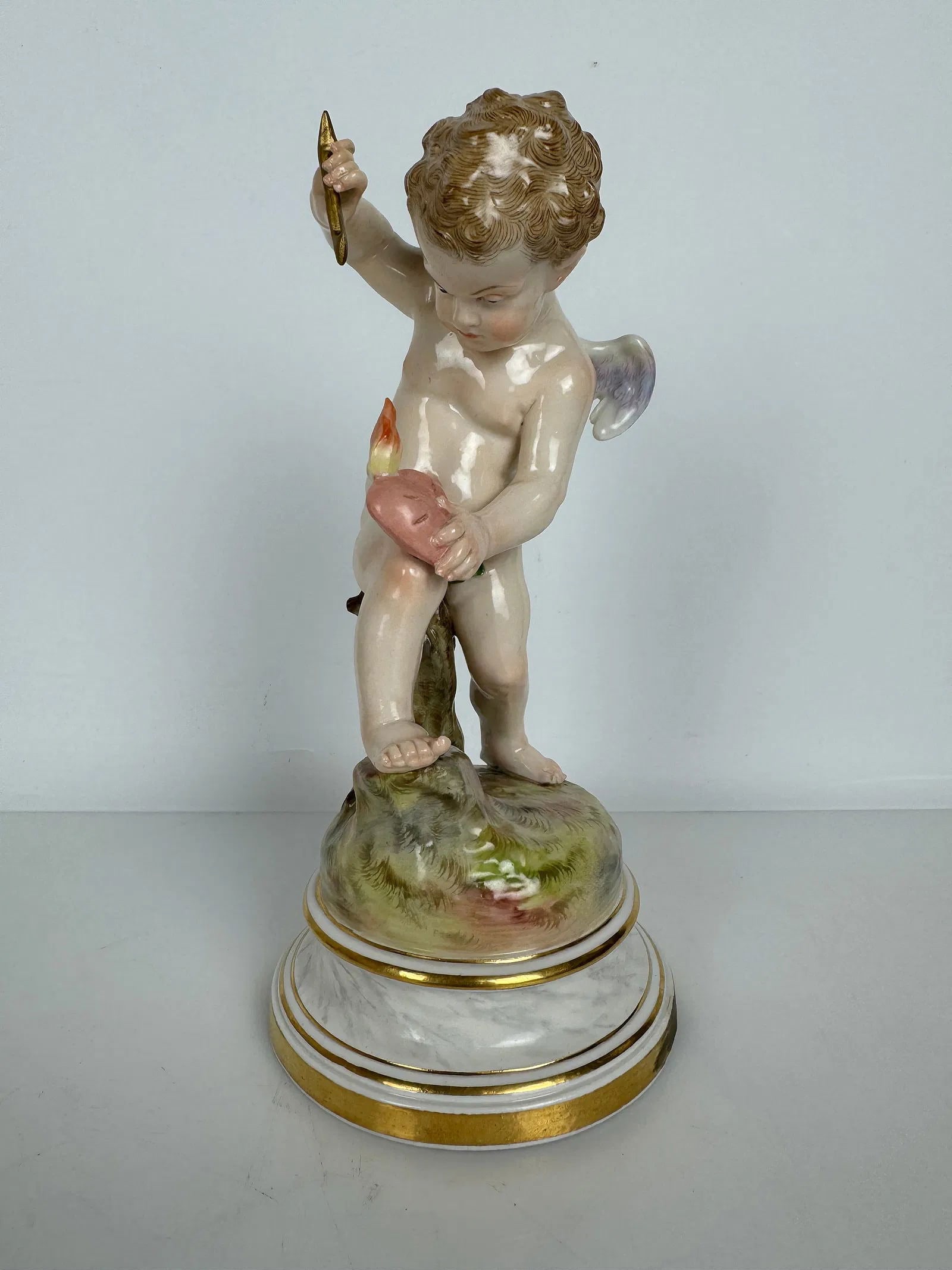 MEISSEN CHERUB L SERIES: Circa 1900. First quality mark. Measures 8 inches h. In excellent condition. Estimate $1000-1200