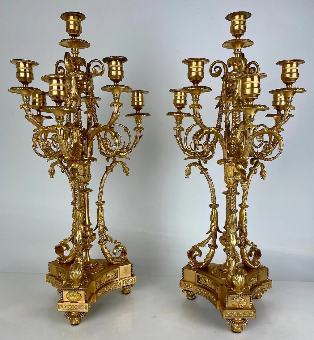 A FINE PAIR OF ORMOLU CANDELABRA: Circa 1880. Measures 25 inches high. In excellent condition. Estimate $1500-2000