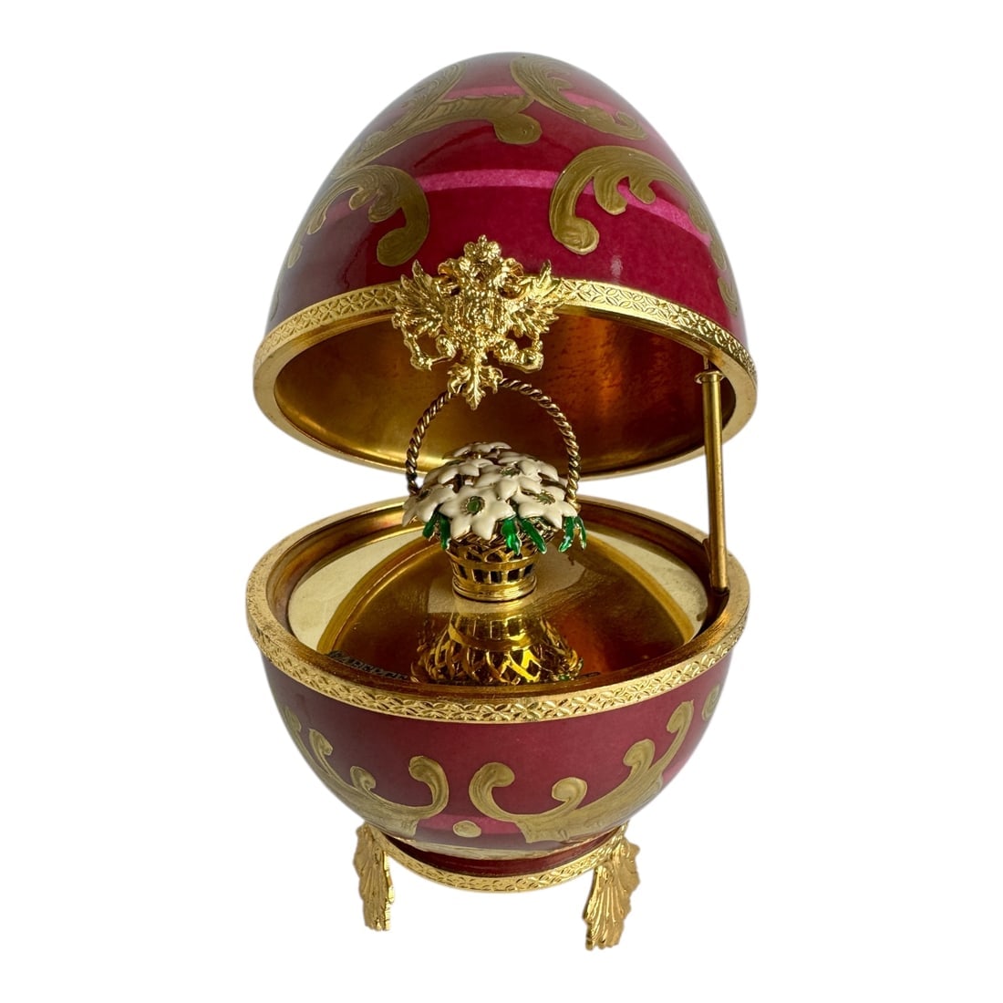 A LARGE IMPERIAL FABERGE LIMOGE PORCELAIN AND STERLING EGG: Spring Flower Egg , marked English sterling hallmarks , flower bouquet is sterling and enamel. Measures 7 inches h. In excellent condition. Estimate $1200-1500