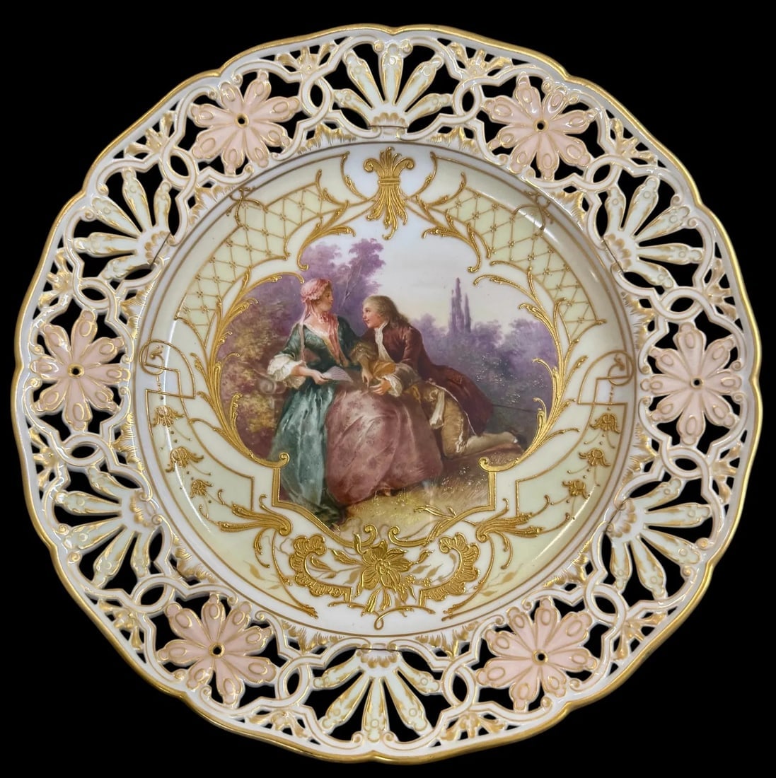 BERLIN KPM RETICULATED AND ENAMELLED PLATE: Circa 1900. Measures 9 inches d. In excellent condition. Estimate $1500-2000