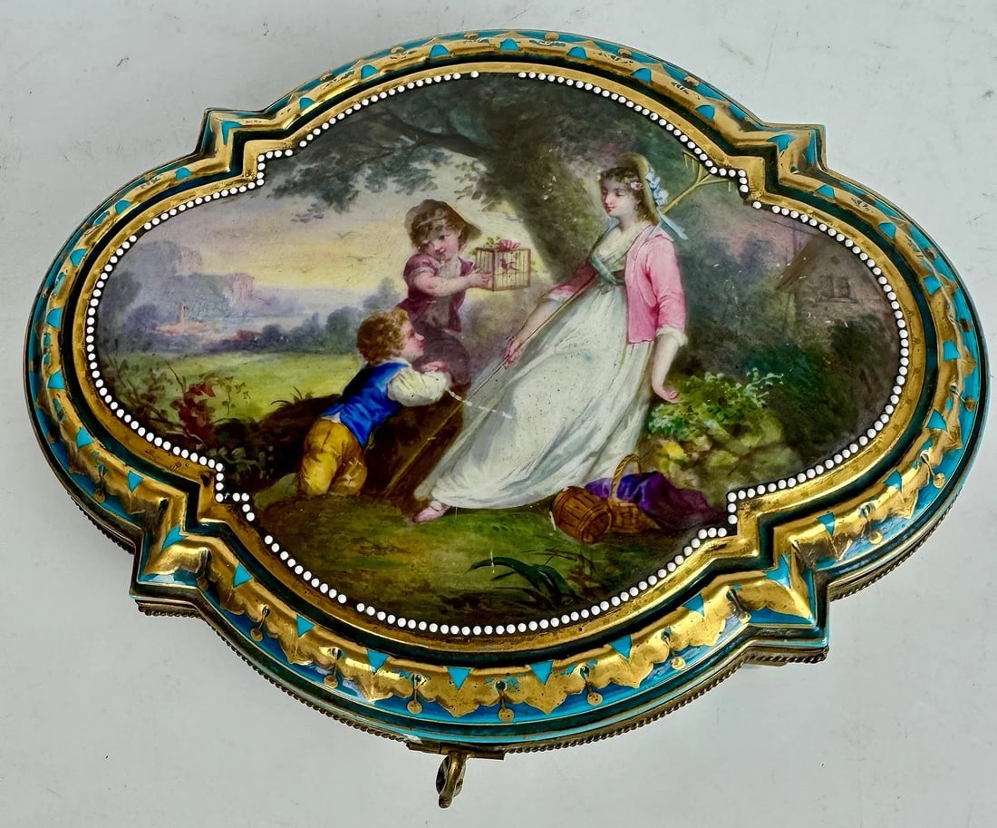 A FINE JEWELED SEVRES PORCELAIN BOX: Circa 1880. Measures 9 inches x 6.5 inches . In overall good condition, minor loss of jewels. Estimate $1200-1500