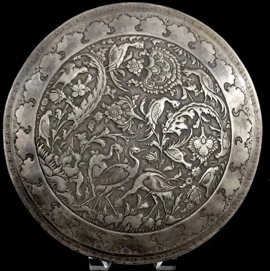 A VERY FINE MID CENTURY PERSIAN SILVER BOX: Marked 84 , and makers name. Measures 10 inches diameter , and weighs 999 grams. Good condition.Estimate $3000-3500