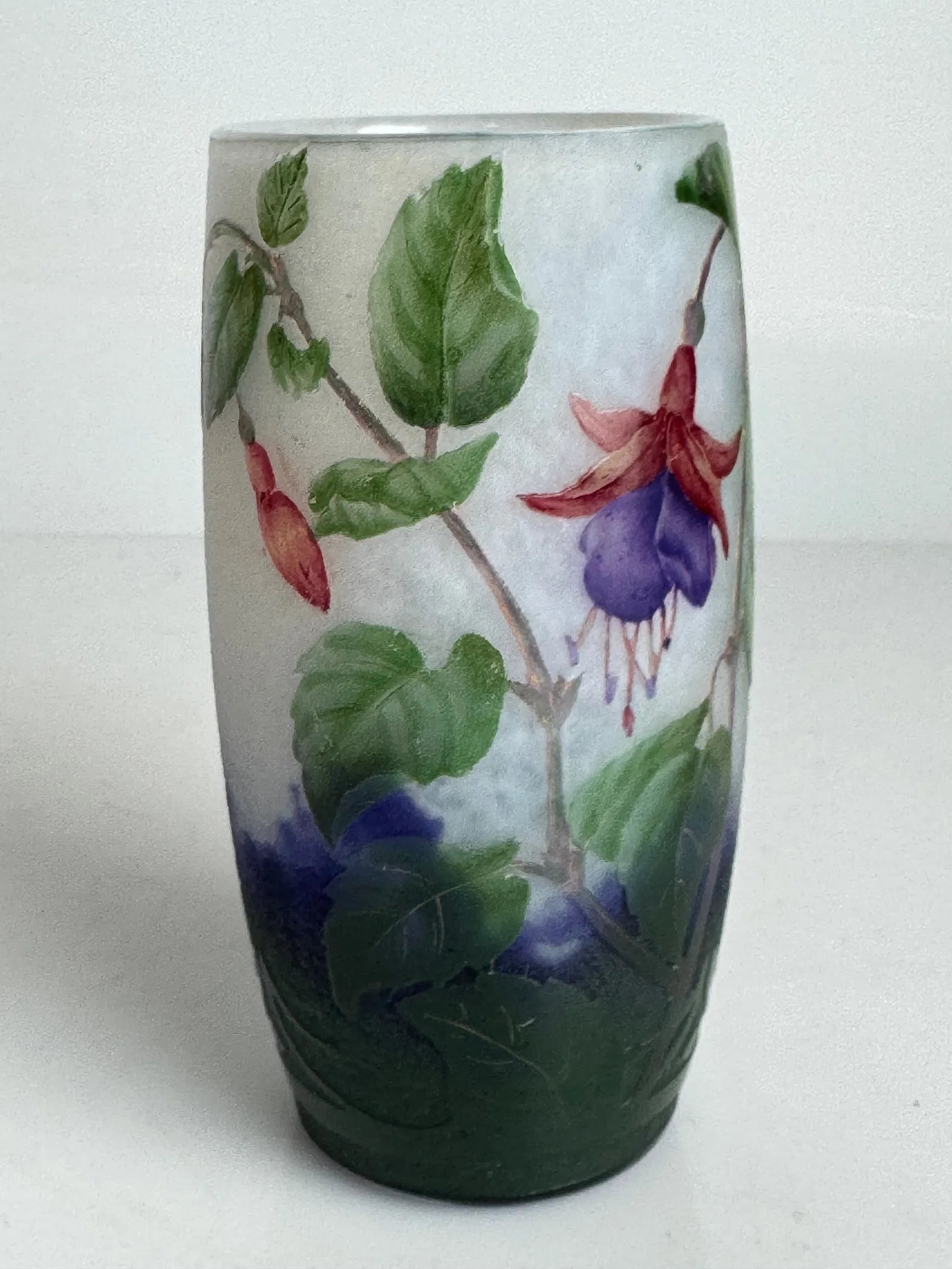DAUM NANCY VASE: Circa 1900. fuchsia decoration, very good condition. 4 5/8 inches tall × 2.5 inches wide. Excellent condition Estimate $2500-3000
