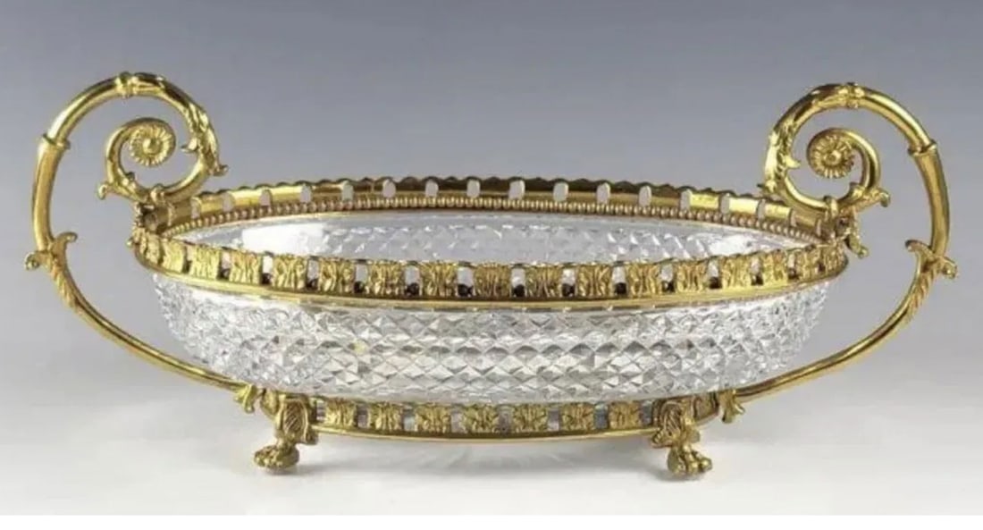 ORMOLU MOUNTED BACCARAT STYLE CRYSTAL BOWL: Measures 16 inches long. In good condition. Estimate $1.200-1.500