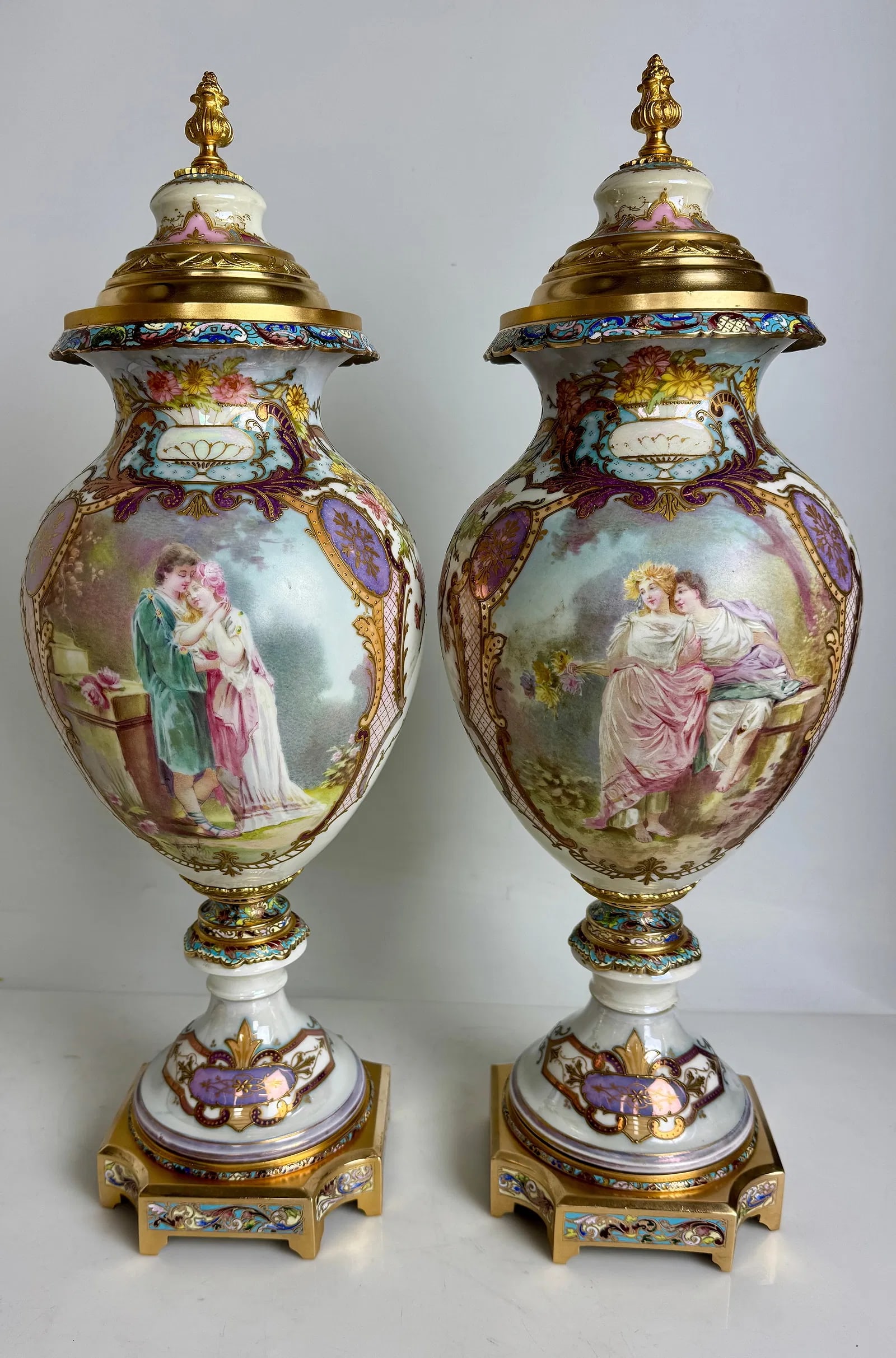 A MAGNIFICENT PAIR OF CHAMPLEVE AND SEVRES VASES BY MAXANT: Circa 1920. Measure 22 inches h. No damage, no restoration. Signed MAXANT. Estimate $15000-20000
