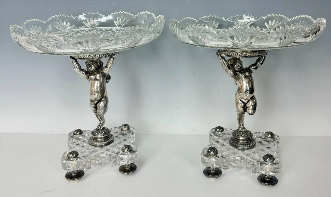A PAIR OF SILVERED BRONZE AND BACCARAT CRYSTAL TAZZAS: Circa 1900. Stamped Baccarat. Measure 9 inches d., 9 inches high. In excellent condition. Estimate $2500-3000