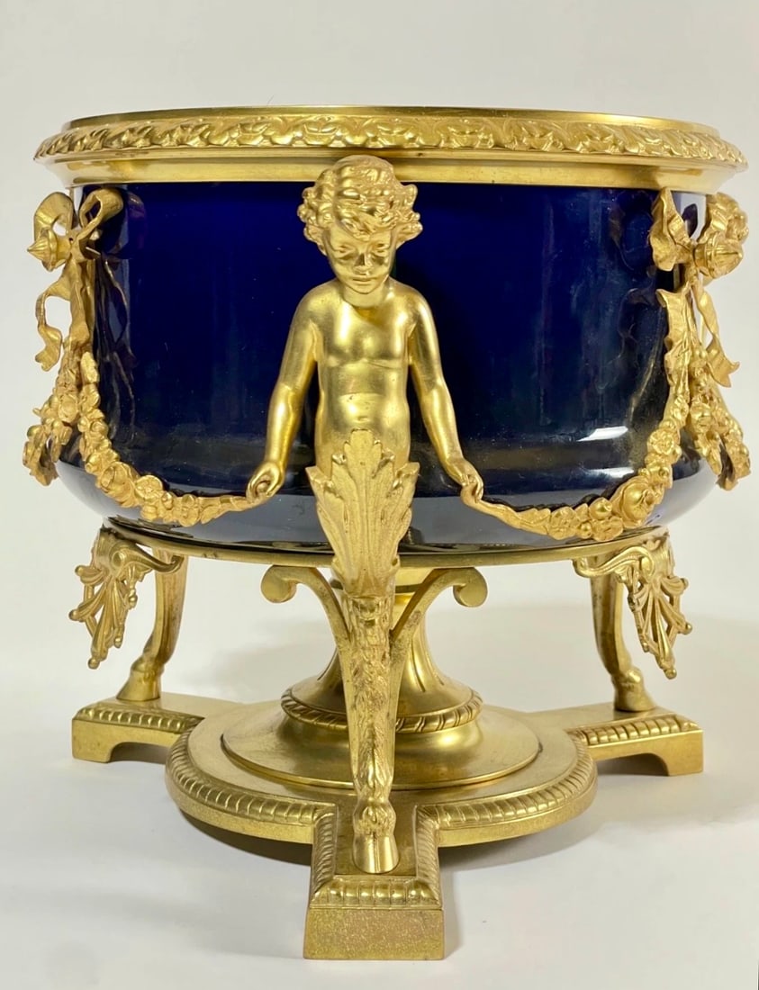 ORMOLU MOUNTED SEVRES PORCELAIN CENTREPIECE: Circa 1900. Measures 9” h., 9” d. In good condition. Estimate $1200-1500