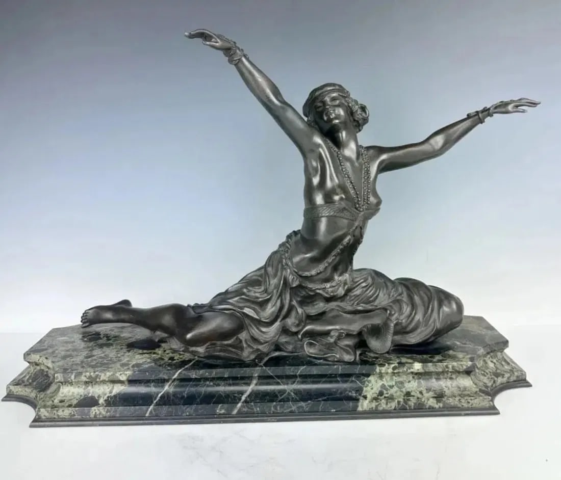 A LARGE BRONZE SCULPTURE COLINET: Measures 26 inches Long, 17 inches high. Very nice patina on a verde marble base. Signed COLINET. Estimate $4.000-5.000