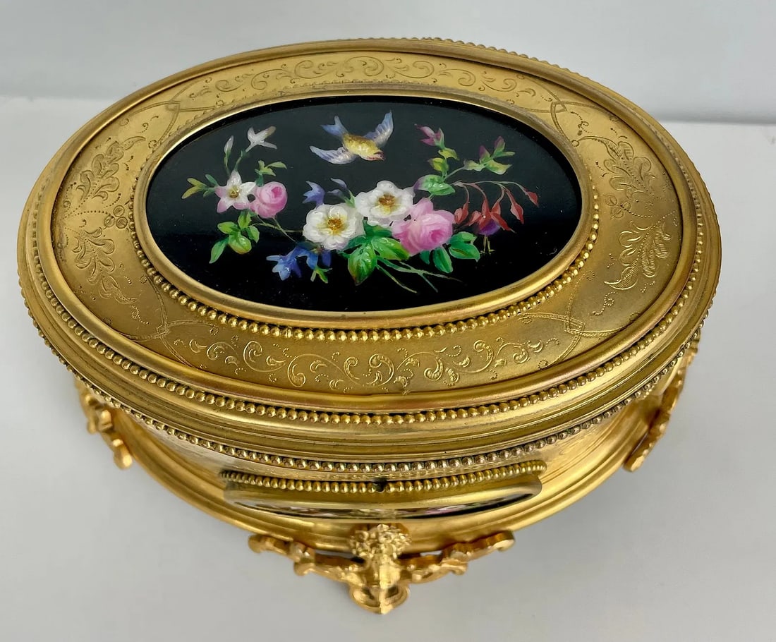 19TH C. FRENCH ORMOLU MOUNTED PORCELAIN BOX: Measures 7.5 inches x 5 inches x 5 inches . Rey good condition. Estimate $1200-1500