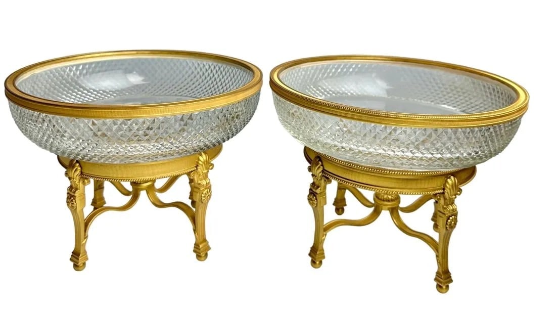 A PAIR OF EMPIRE STYLE DORE BRONZE AND BACCARAT CRYSTAL BOWLS: Circa 1900. Measure 9 inches d. , 7 inches h. In good antique condition. Estimate $2.000-2.500