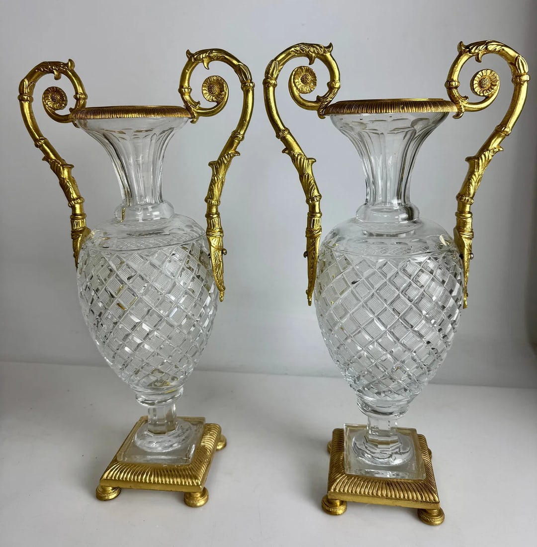 A PAIR OF EMPIRE STYLE ORMOLU MOUNTED BACCARAT STYLE VASES: Measure 17 inches high. In very good condition. No chips, no cracks. Estimate $1500-2000