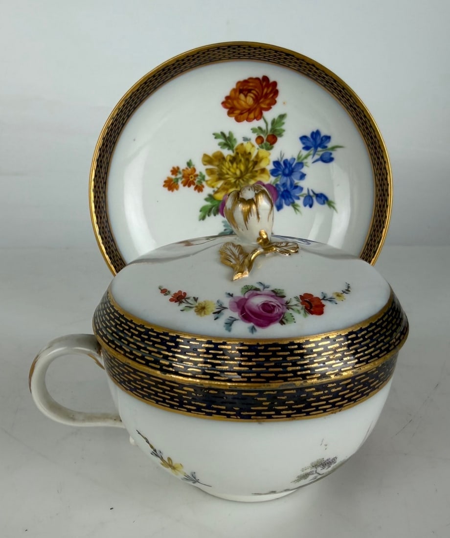 19TH C. MEISSEN LIDDED CUP AND SAUCER: First quality. In excellent condition. Saucer 5.5 inches d. Estimate $800-1000