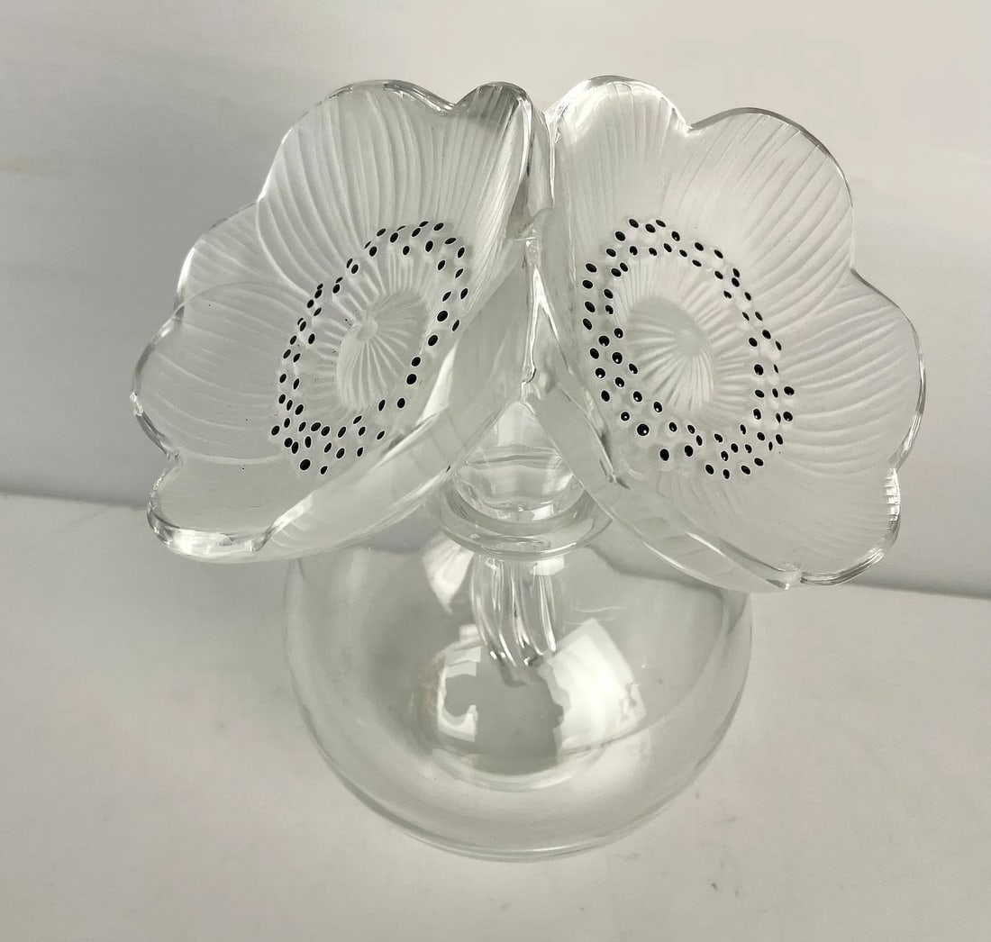 LALIQUE PERFUME BOTTLE: Lalique Perfume Bottle “Les Anemone inches . Measures 6.5 inches h. Signed Lalique France. In excellent condition. Estimate $1500-2000