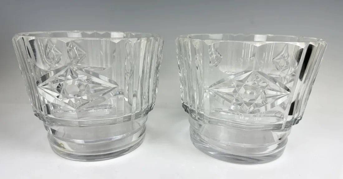 A PAIR OF SIGNED BACCARAT BOWLS: Both with etched Baccarat marks. Measure 7.5 inches d., 6 inches high. In good condition.Estimate $800-1.000