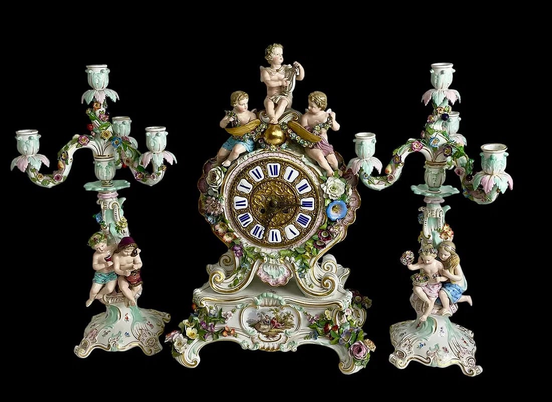 19TH C. MEISSEN CLOCK SET: Clock measures 22 inches high. In overall good condition. Estimate $12000-15000