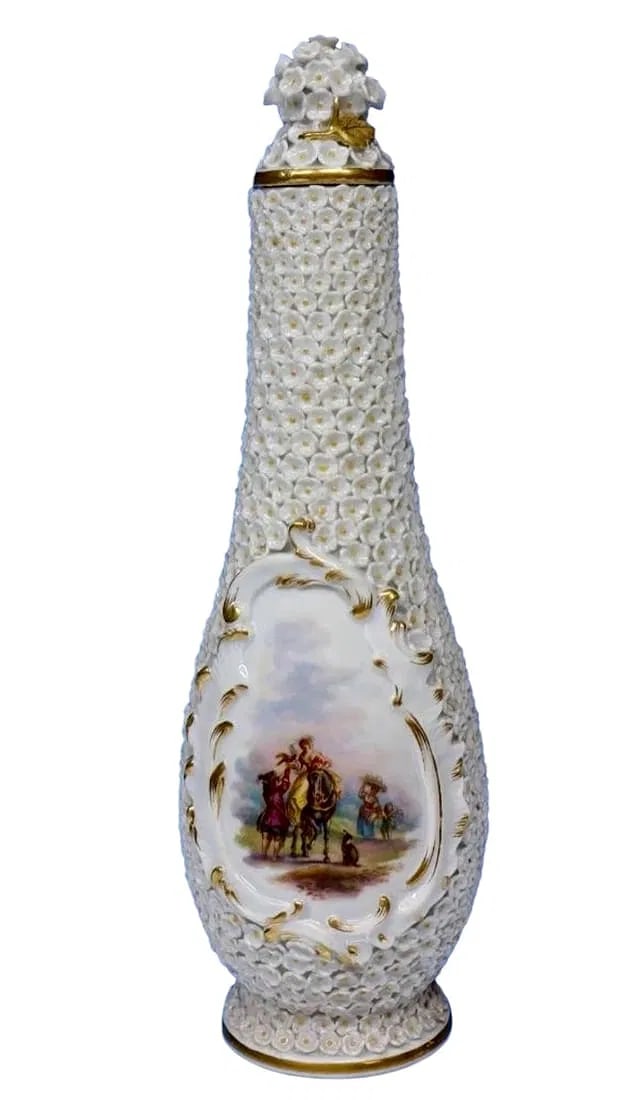 19TH C. MEISSEN SNOWBALL BOTTLE AND TOP: First quality measures 10 inches h. In good condition. Estimate $2500-3000