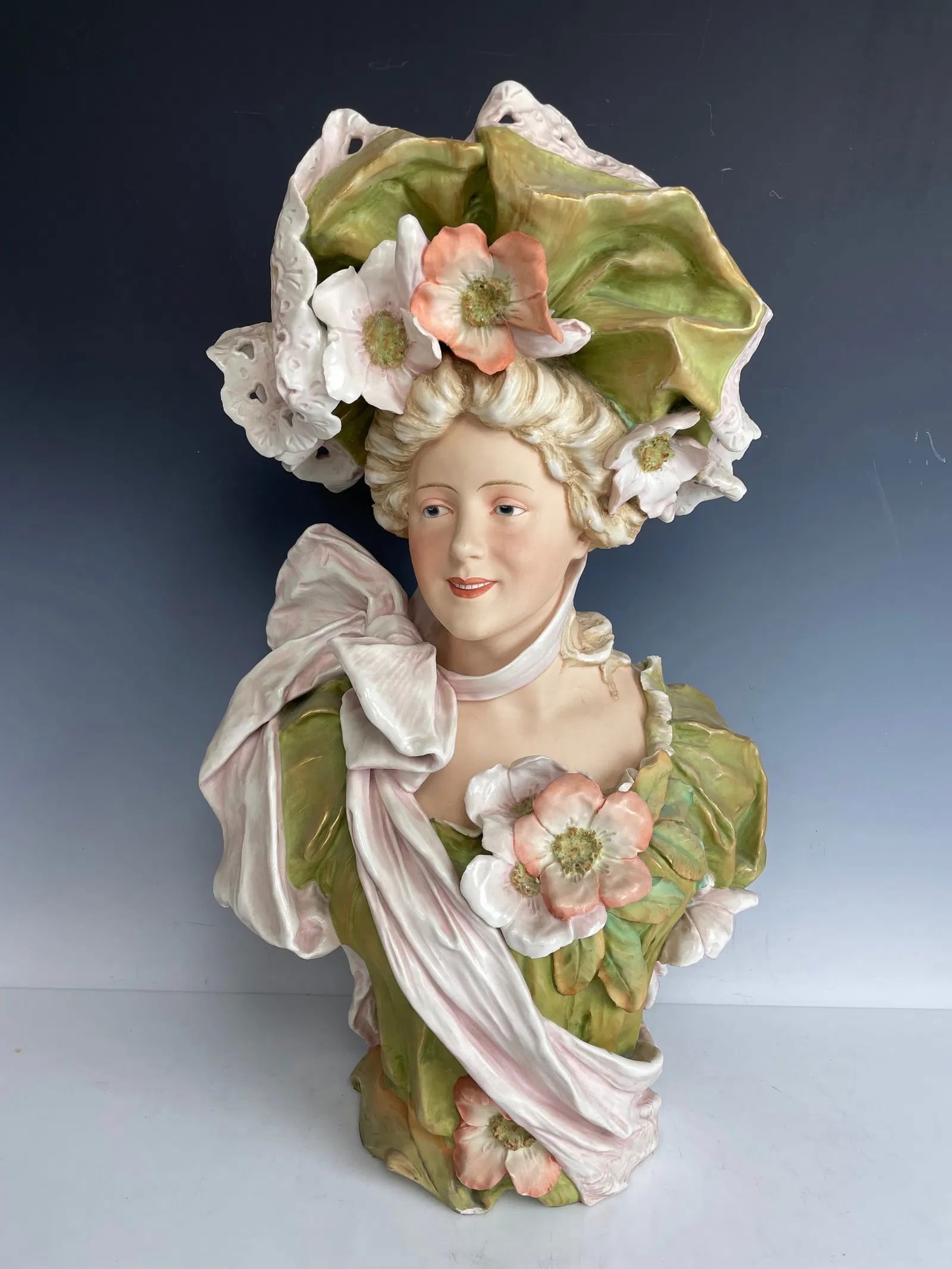 A LARGE ART NOUVEAU ROYAL DUX PORCELAIN BUST: Circa 1920. Measures 21 inches high. No damage detected. Estimate $1.000-1.200