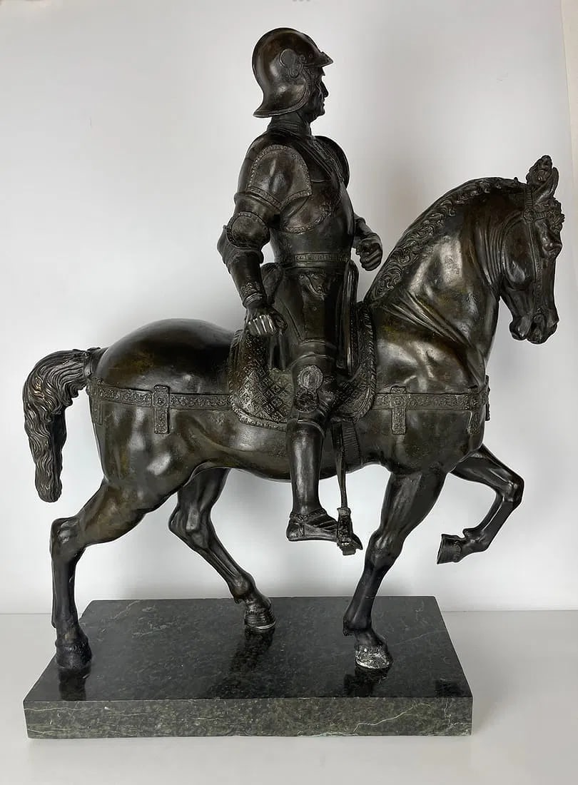 LARGE BRONZE SCULPTURE OF A SOLDIER ON HORSE: Measures 30 inches tall, 27 inches long. In good condition. Estimate $4000-5000