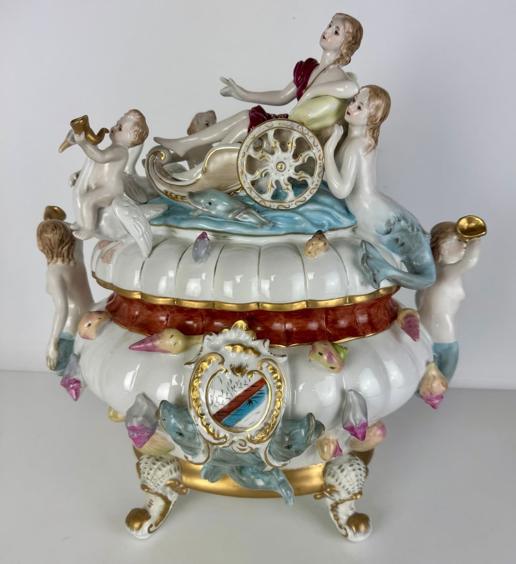 A LARGE GERMAN PORCELAIN TUREEN: Circa 1940. Measures 16 inches l. In overall good condition. Meissen cross sword mark. Estimate $1500-2000