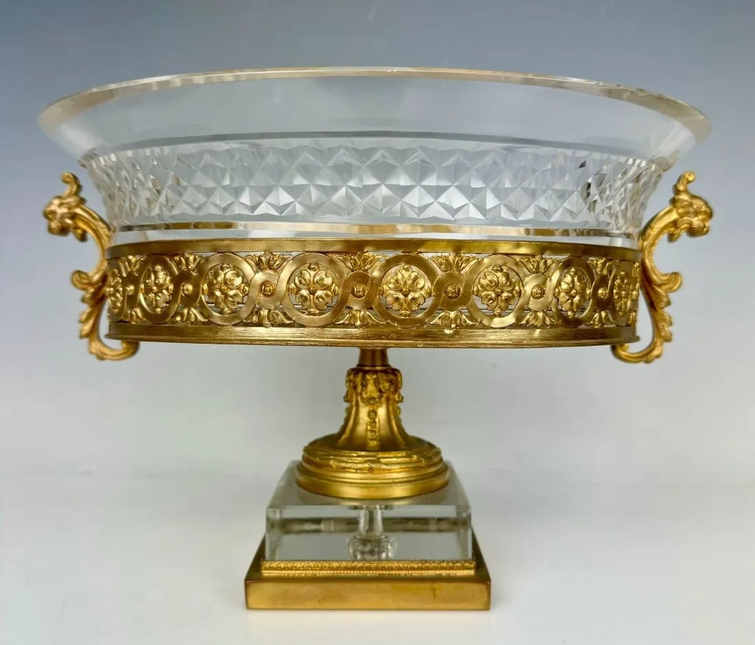 ORMOLU AND BACCARAT CRYSTAL CENTERPIECE: Circa 1900. Measures 13 inches long, 10 inches tall. In good condition. Estimate $1.500-2.000