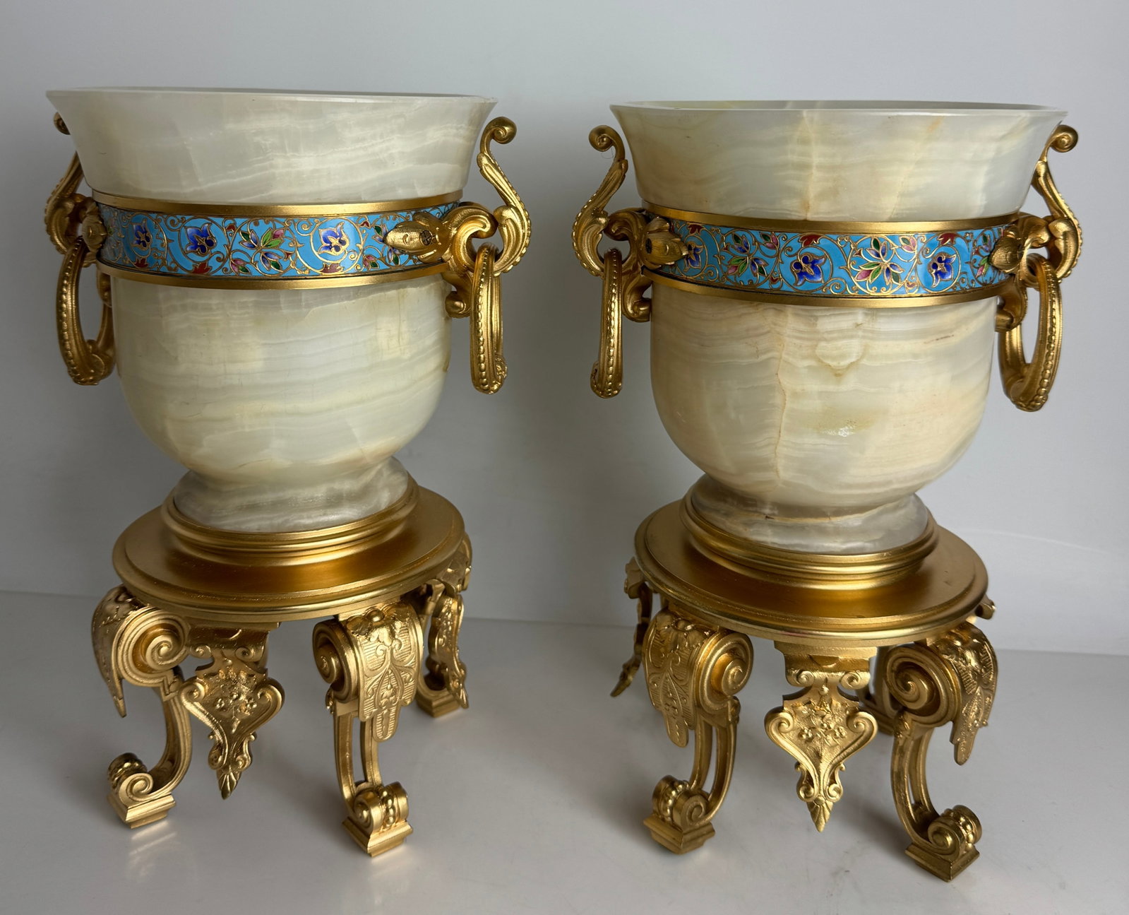 A PAIR OF FRENCH CHAMPLEVE ENAMEL AND ONYX CENTERPIECES (1 of 5)